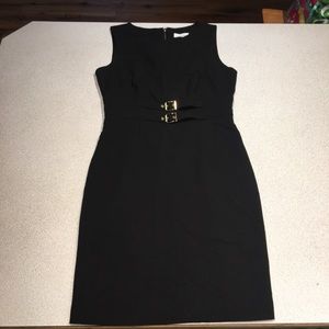 Calvin Klein black dress with gold buckle accents